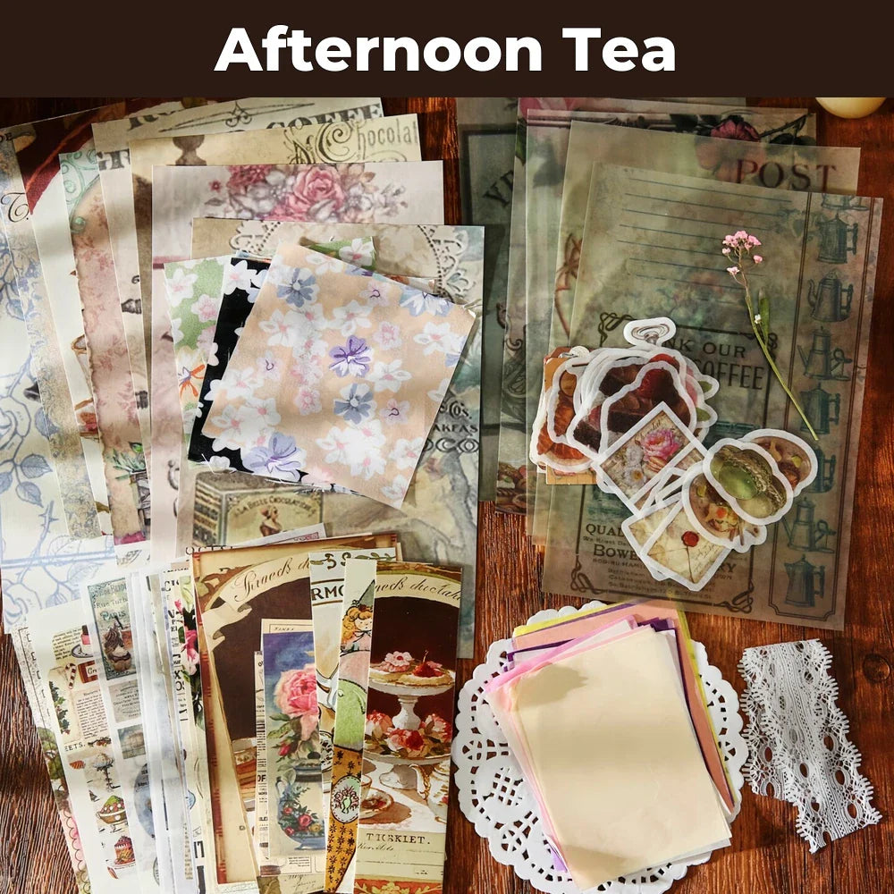 Afternoon Tea Junk Journal Kit flat lay showing the coordinated papers, ephemera, stickers, and craft embellishments included in the set
