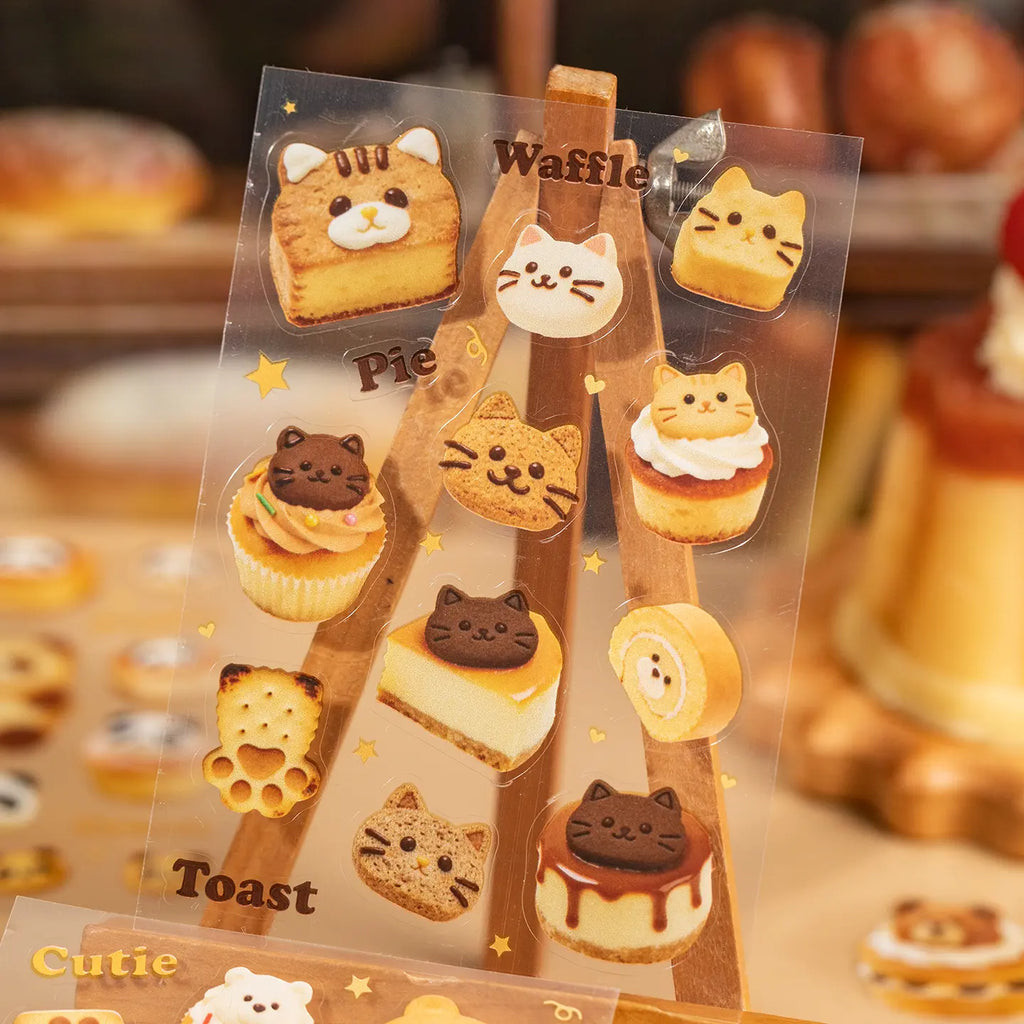 Close-up of a transparent cat dessert sticker sheet from the Baking Story Journaling Sticker Set