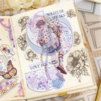 Journal page decorated with Book Border stickers, floral line art, layered collage elements, and an illustrated character
