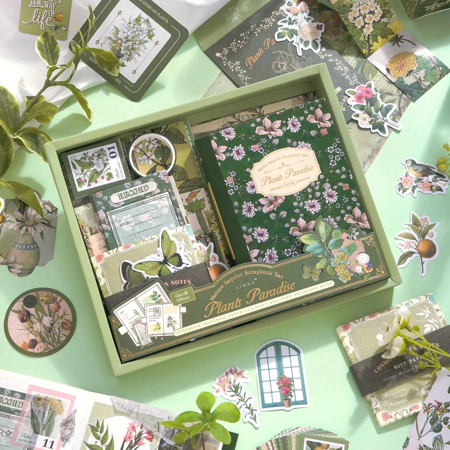 Botanical Haven Junk Journal Kit gallery image 1 showing botanical papers, leafy stickers, and nature-inspired ephemera for junk journaling and scrapbooking