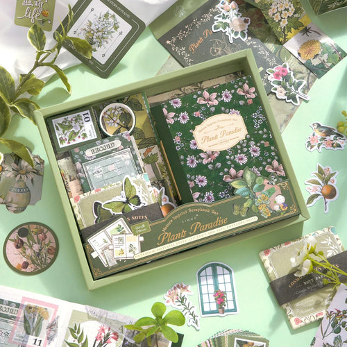 Botanical Haven Junk Journal Kit gallery image 1 showing botanical papers, leafy stickers, and nature-inspired ephemera for junk journaling and scrapbooking
