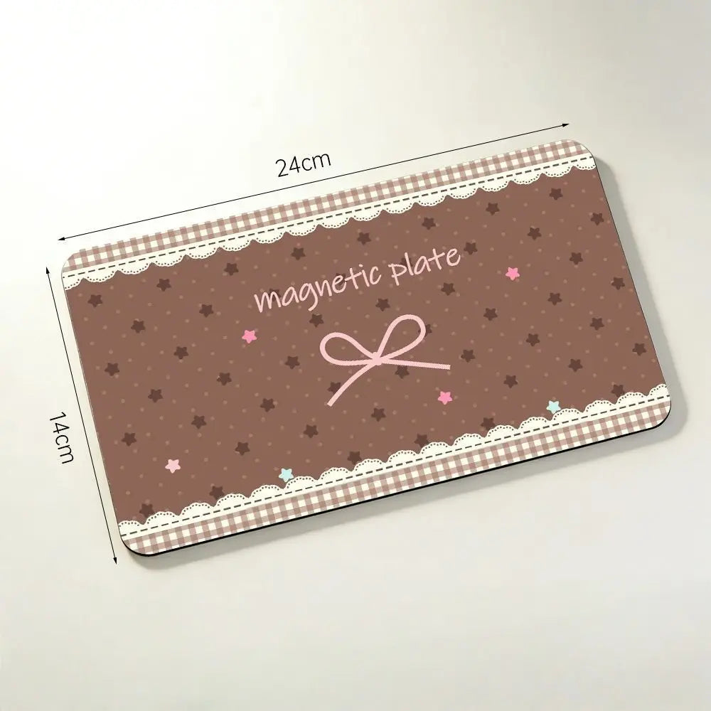 Brown bow magnetic tweezer storage board with 24 by 14 cm size measurement