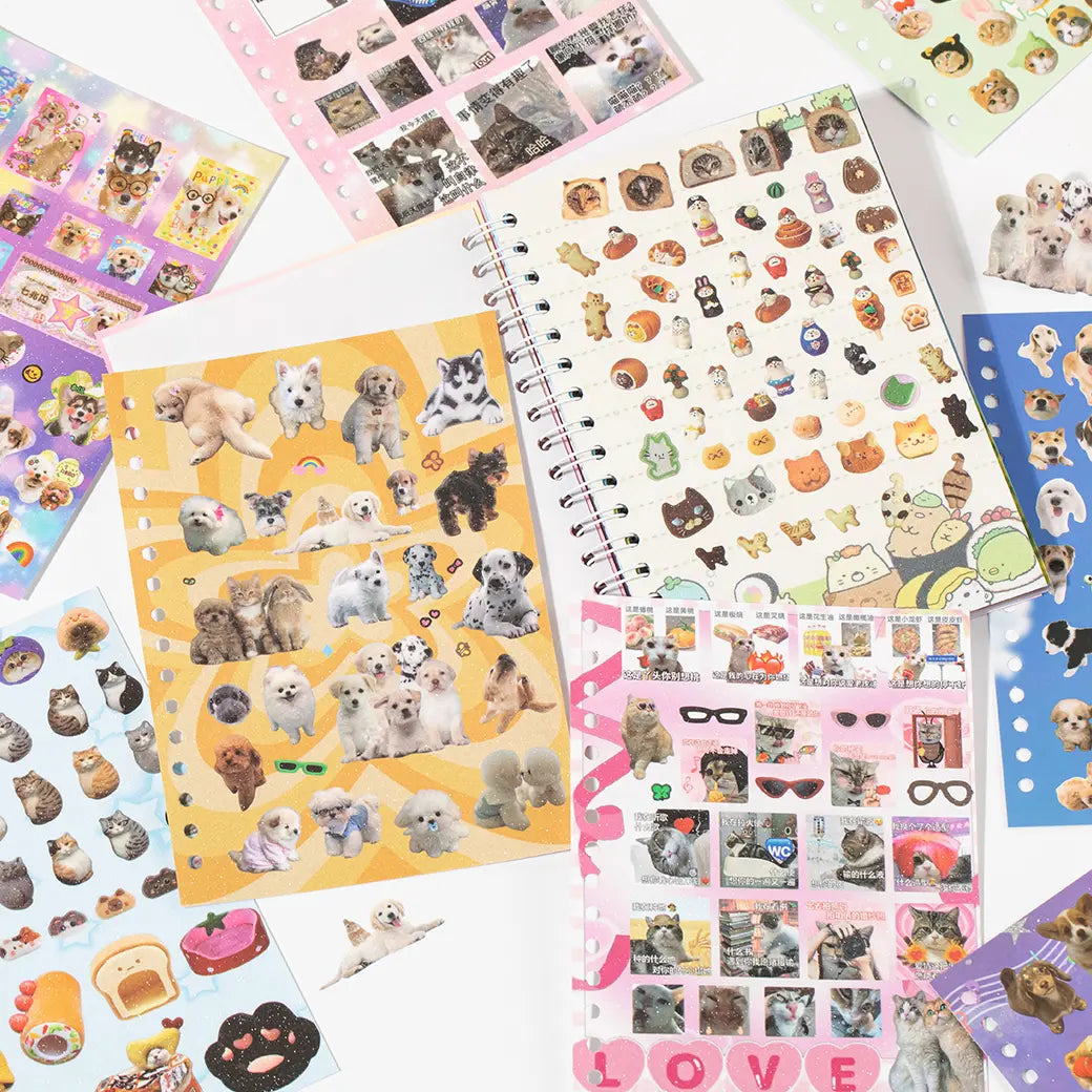 Cat and dog sticker sheets displayed with a spiral sticker pack