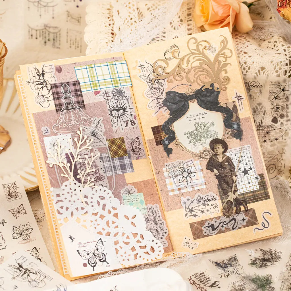 Paper cup decorated with layered butterfly, music, grid, and celestial journaling stickers