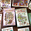 Chronicle of Time and Star Travel Wonders 3D scene sticker kit set with two postcard-style packages on a wooden desk