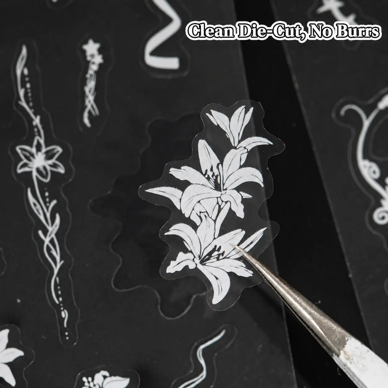 Close-up of a white floral PET sticker with clean die-cut edges