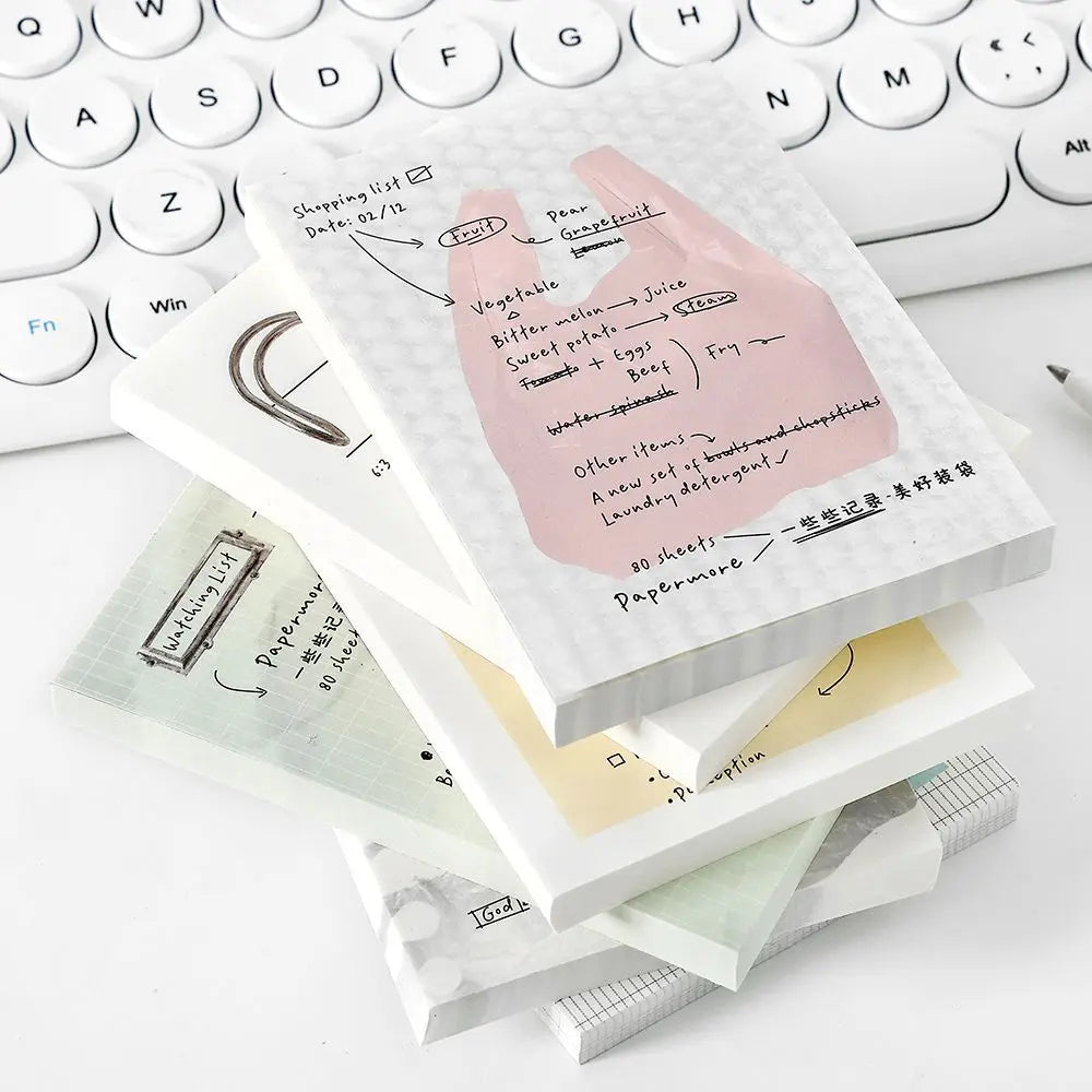Clipboard Planner memo pad writing layout with clipboard-inspired pages for daily plans and journal entries.