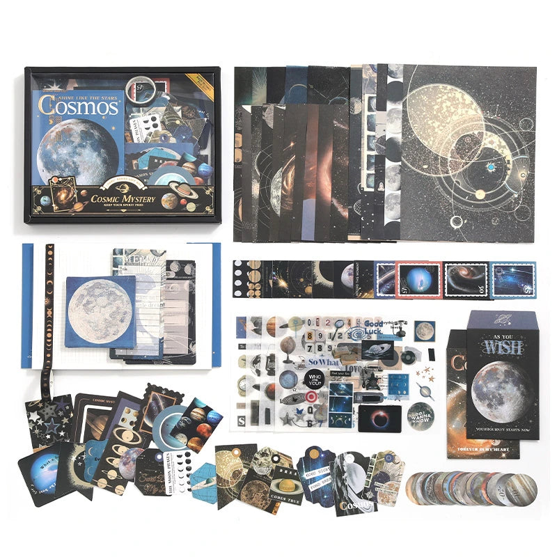Cosmic Mystery Junk Journal Kit full contents flat lay showing coordinated celestial journaling supplies