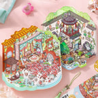 Two finished courtyard garden 3D scene sticker kits with pavilion, flowers, lanterns, and garden details
