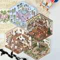 Cozy Room Stories 3D scene sticker kit set showing four finished miniature room scenes including a bedroom, bookstore, café, and Japanese-style dining room