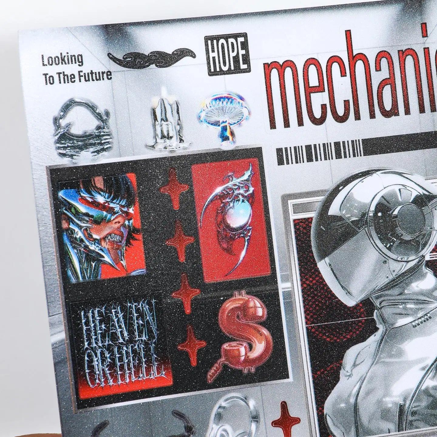 Close-up of a Cyber Illusion mechanical-style sticker sheet with chrome, red, and black details