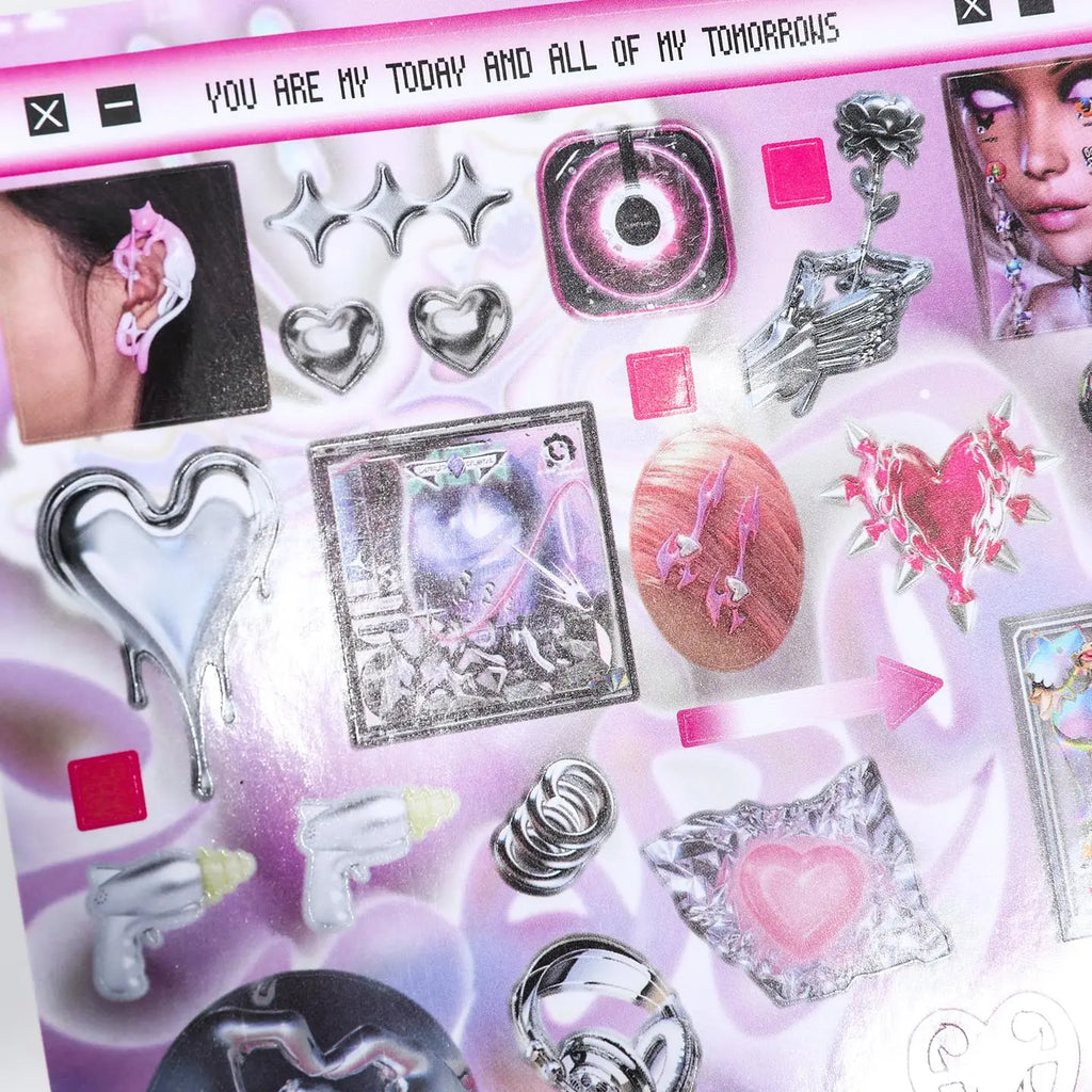 Close-up of Cyber Illusion pink and chrome stickers with hearts, arrows, and futuristic graphics