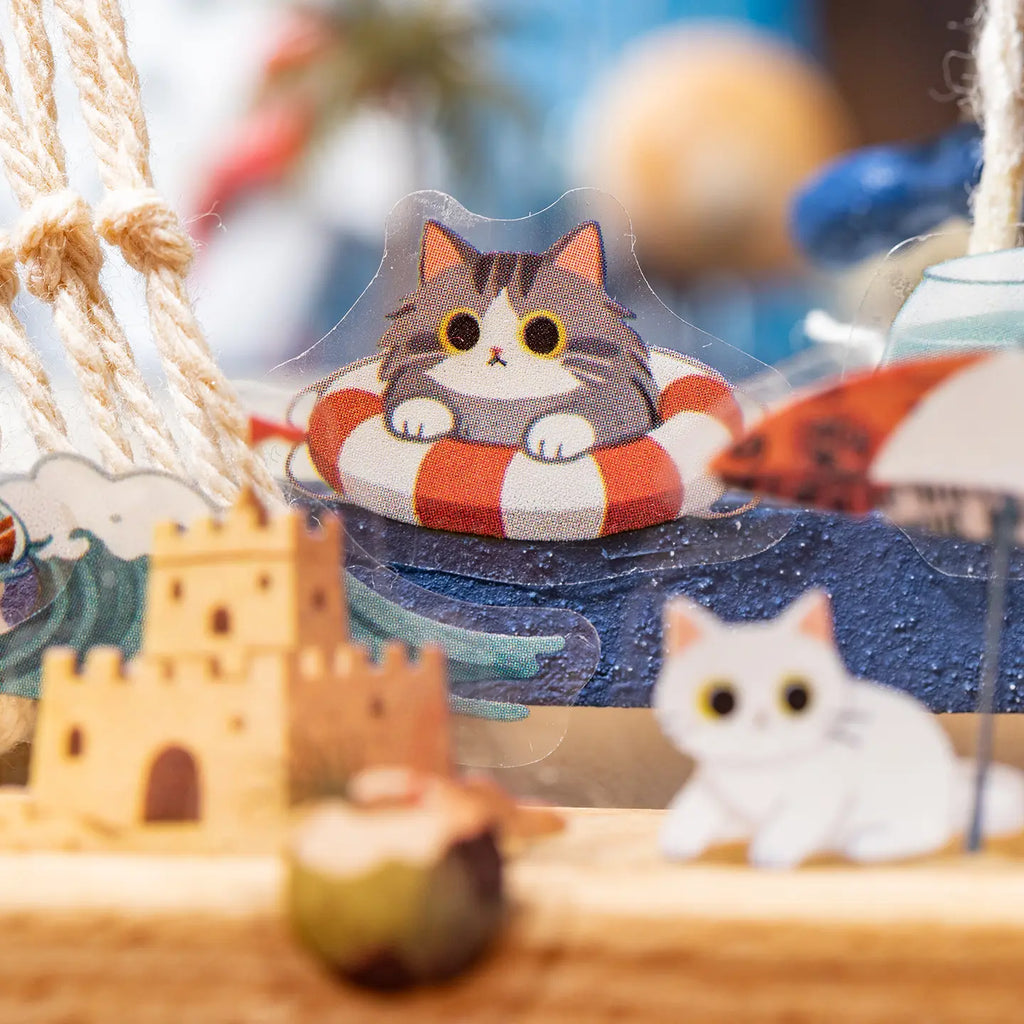 Close-up of a Daily Serenity seaside cat sticker in a layered journaling scene