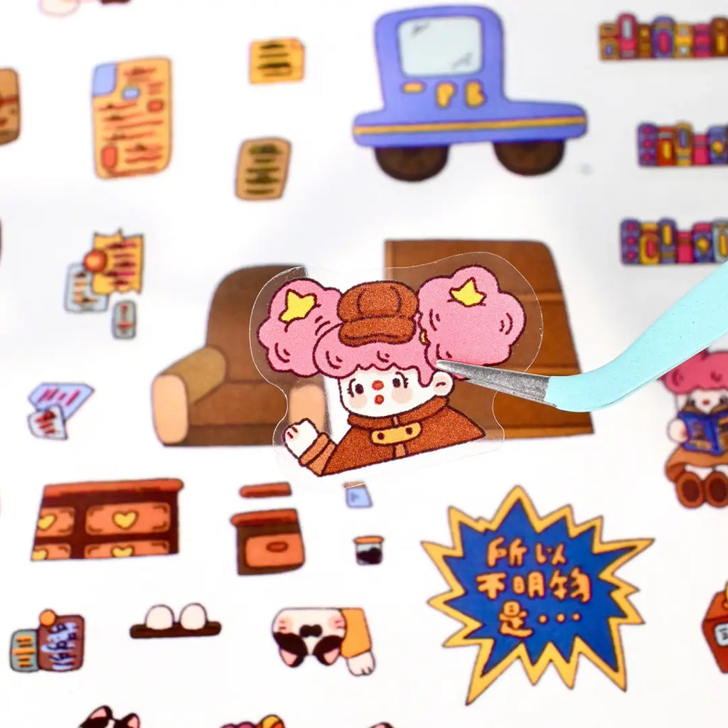 Close-up of a pre-cut detective character sticker being peeled from the sheet