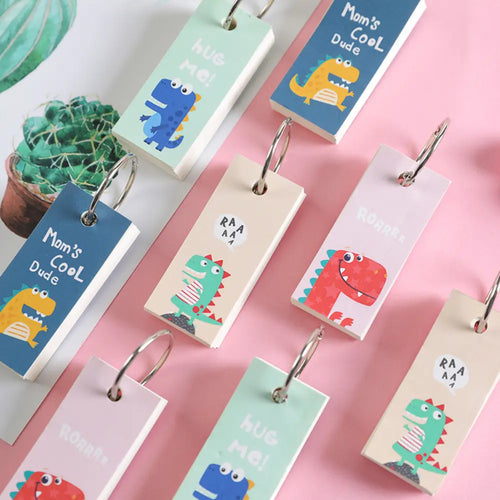Dinosaur Ring memo pad with portable hanging ring design for quick notes, journals, and planner ideas.