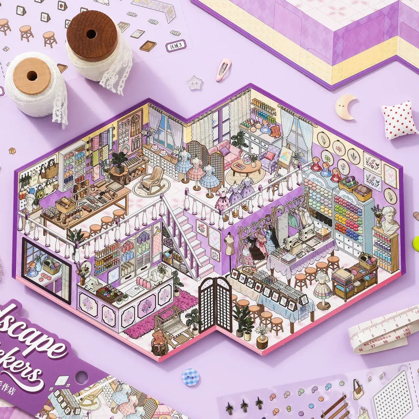 Dreamy Craft Shop 3D Scene Sticker Kit finished display with fabric shelves, sewing tables, dresses, and a purple miniature craft store layout
