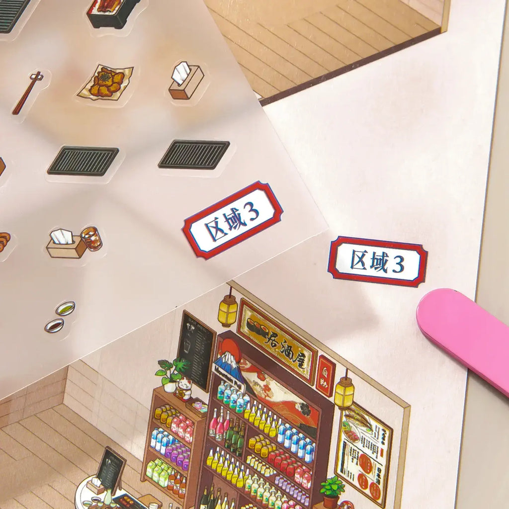 Zoned reference detail for placing frosted PET stickers onto the Japanese deli scene card