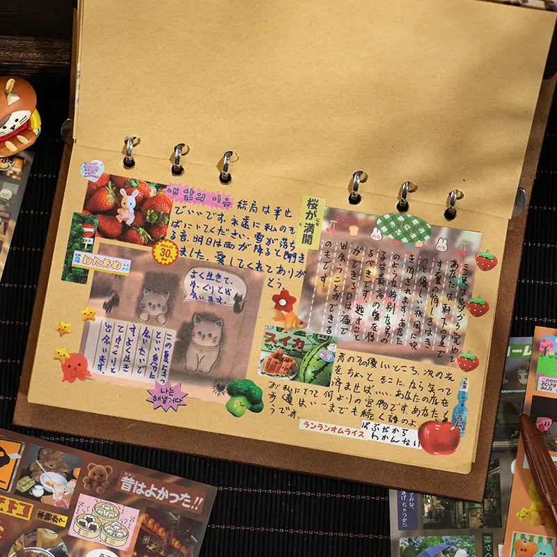 Kraft journal page decorated with stickers from the Echoes of Memory Journaling Sticker Book