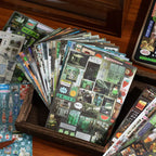 Fanned sticker pages from the Echoes of Memory Journaling Sticker Book showing assorted retro street and memory collage designs