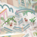 Close-up of Eden Garden sticker sheet showing curved railings, vines, chairs, planters, and numbered placement pieces