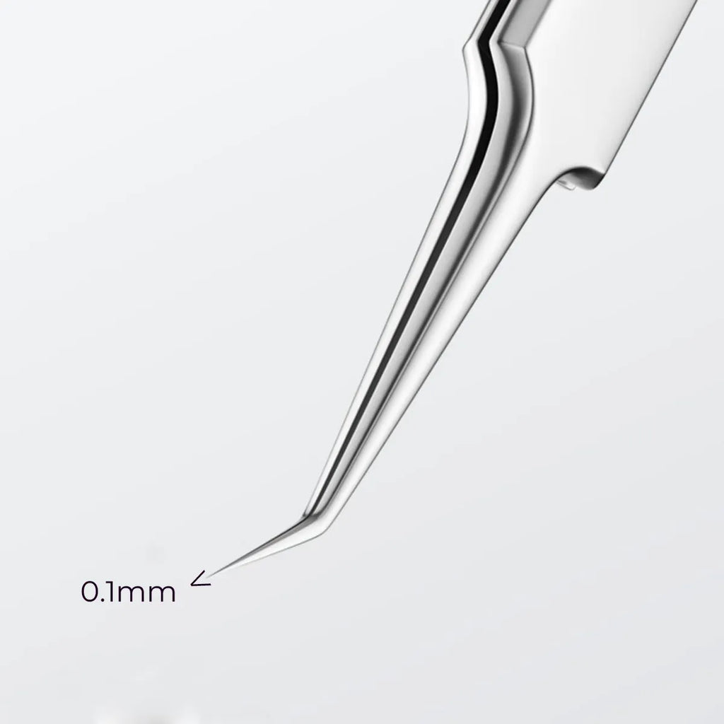 Close-up of 0.1 mm fine tip on stainless steel sticker tweezers
