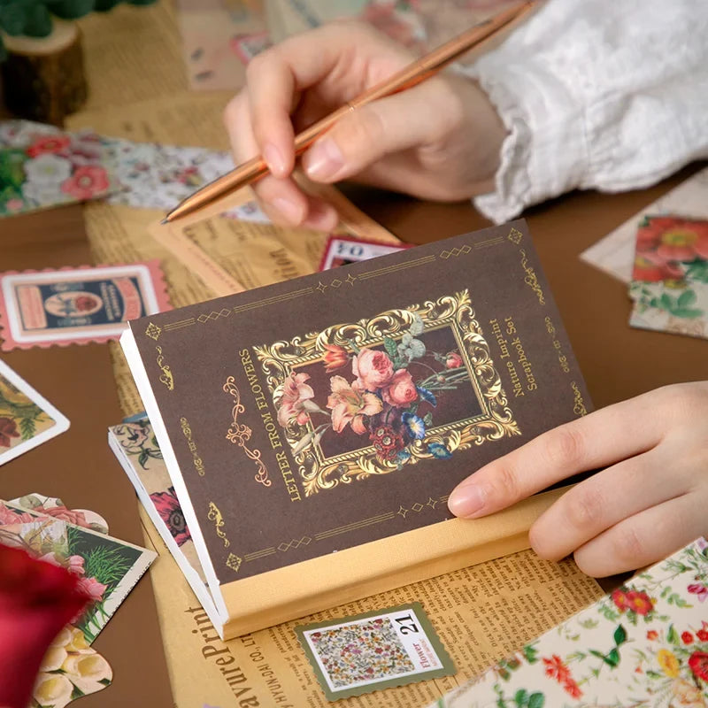 Floral Correspondence Junk Journal Kit gallery image 4 showing floral papers, letter-style ephemera, stickers, and journaling accents for scrapbooking and collage