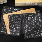 Clear PET sticker sheets with white floral ornaments and decorative line designs for journaling