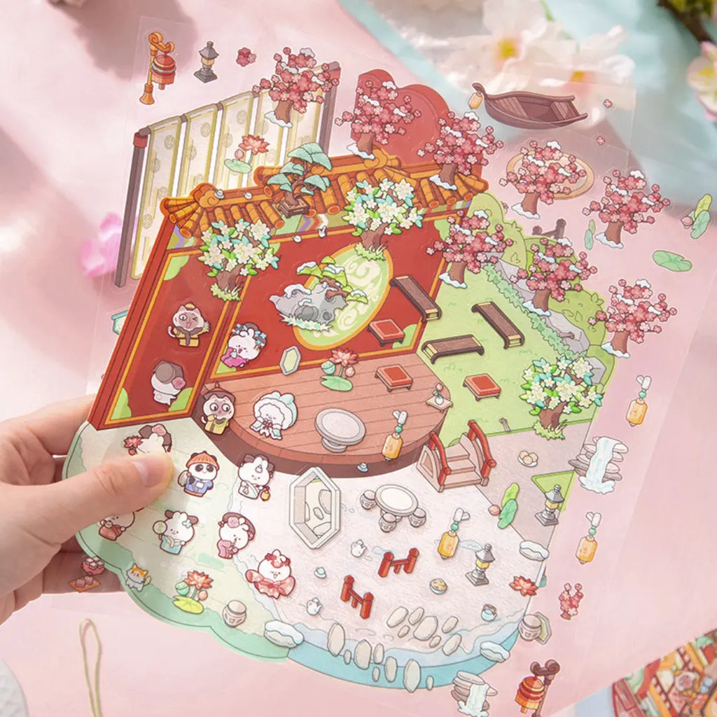 Close-up of the Flying Flowers courtyard scene with cherry blossoms, lanterns, and pre-cut sticker details