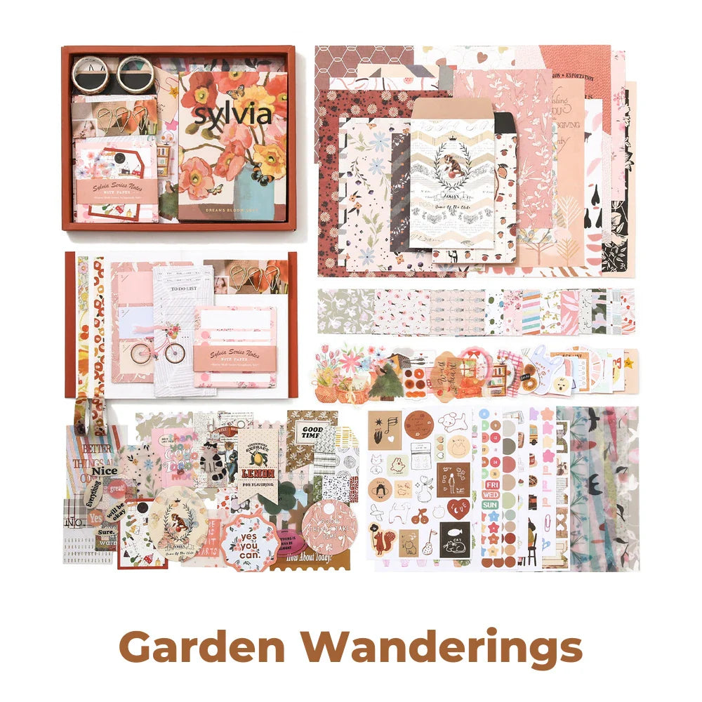 Garden Wanderings Junk Journal Kit flat lay showing the coordinated papers, ephemera, stickers, and craft embellishments included in the set