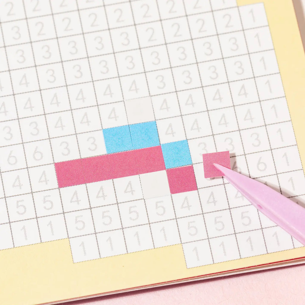 Placing small square stickers onto a numbered pixel mosaic grid from Gourmet Collection