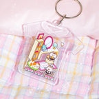 Grand Villa sticker pieces used to decorate a clear acrylic keychain charm