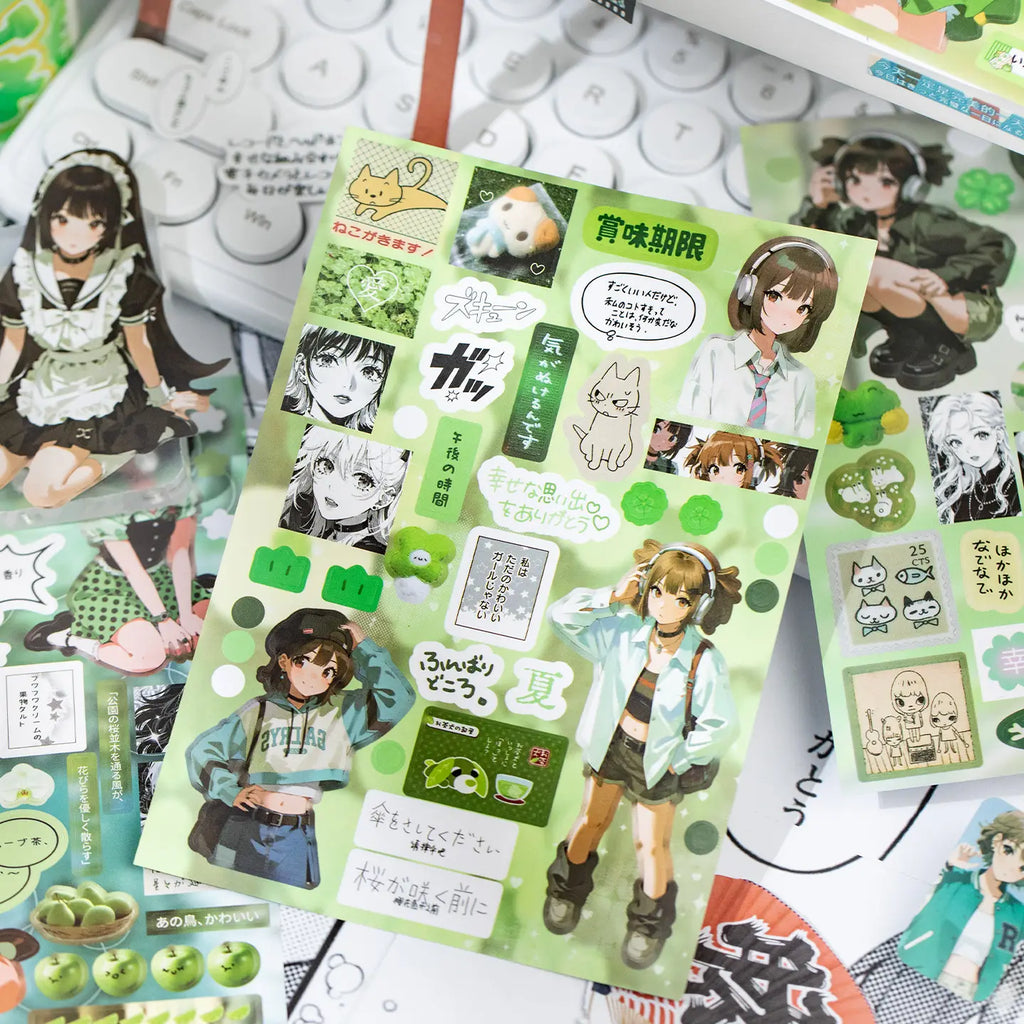 Green character journaling sticker sheet with illustrated girls, manga portraits, cats, phrases, and small decorative elements