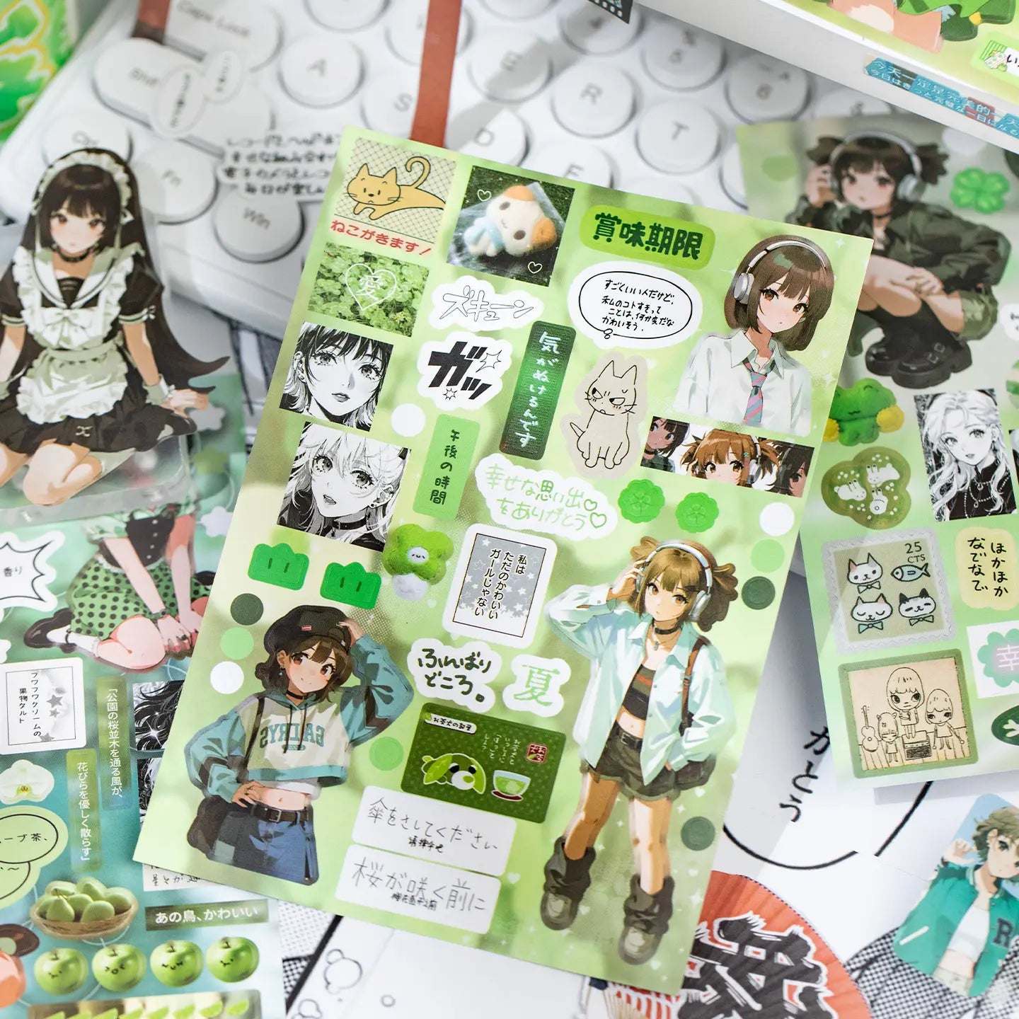 Green character journaling sticker sheet with illustrated girls, manga portraits, cats, phrases, and small decorative elements