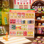Finished supermarket scene card with snack shelves, drinks, and miniature food display stickers