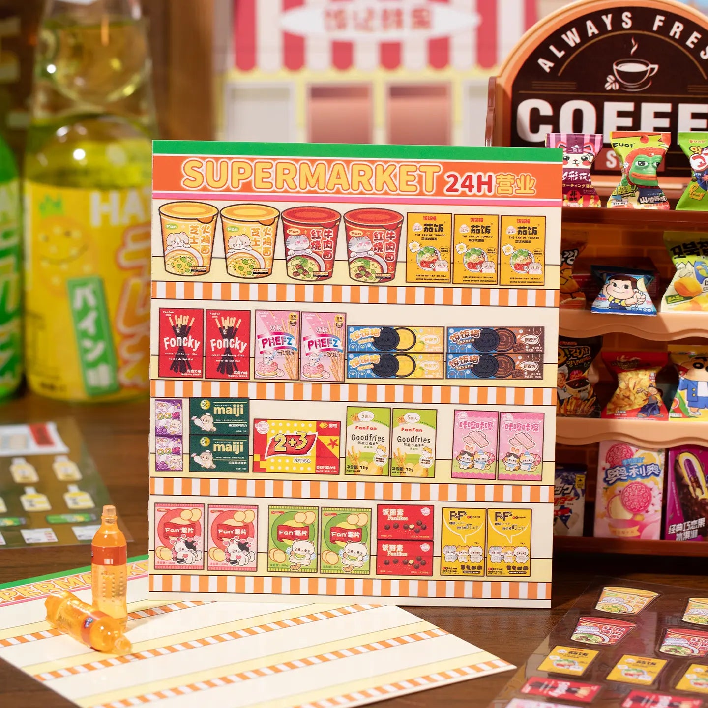 Finished supermarket scene card with snack shelves, drinks, and miniature food display stickers