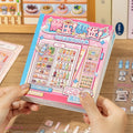 Home Organizer 3D Scene Sticker Book held in hand with pink cover design