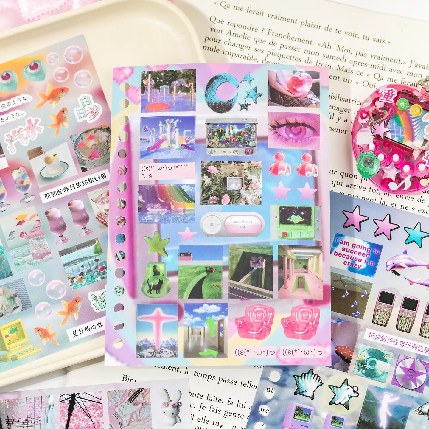 Hands flipping through a journaling sticker pack with colorful dreamy sticker sheets
