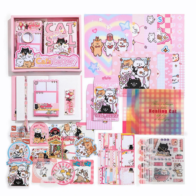 Kitten Mail Junk Journal Kit full contents flat lay showing the coordinated pink cat-themed journaling supplies