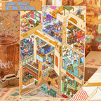 Little Stories in the Carton 3D scene sticker kit showing a finished multi-room cardboard-box miniature building display