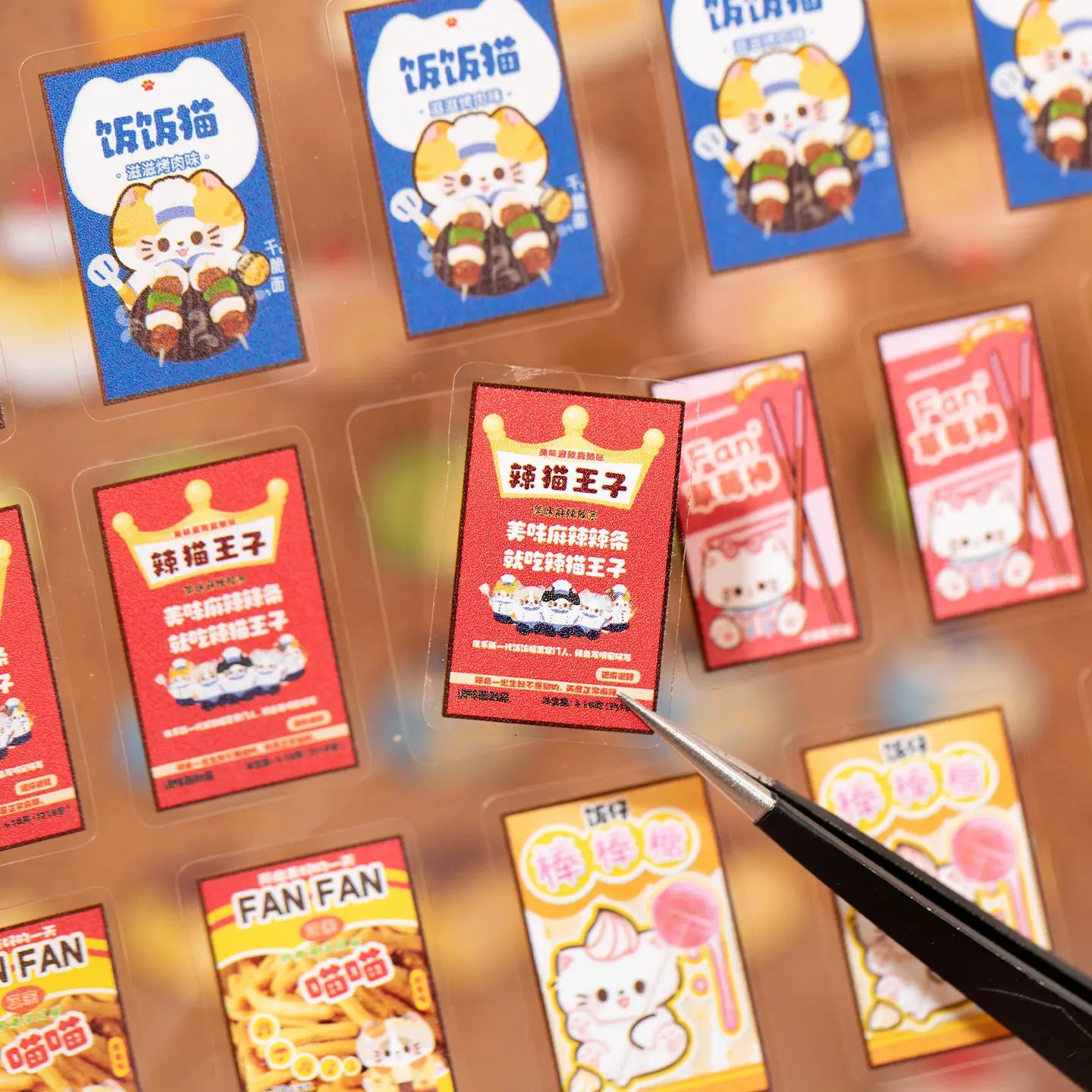 Close-up of small packaged food PET stickers on a transparent sticker sheet