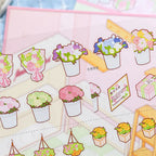 Close-up of Romantic Flower Shop PET sticker sheet with flower bouquets, plants, and decorative pieces