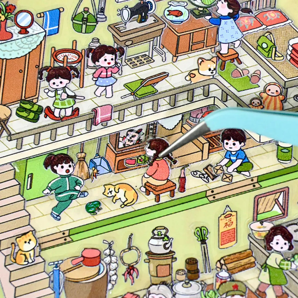 Close-up of a pre-cut character sticker being placed on the green travel-room scene with tweezers