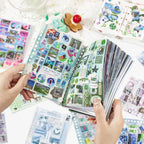 Dreamscape and Monsoon stickers used in a ring-bound journal page collage