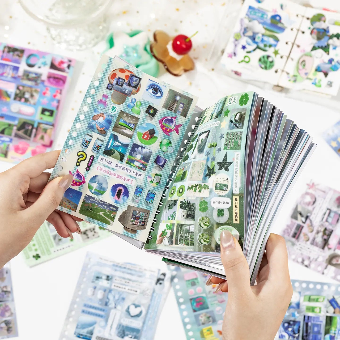 Dreamscape and Monsoon stickers used in a ring-bound journal page collage