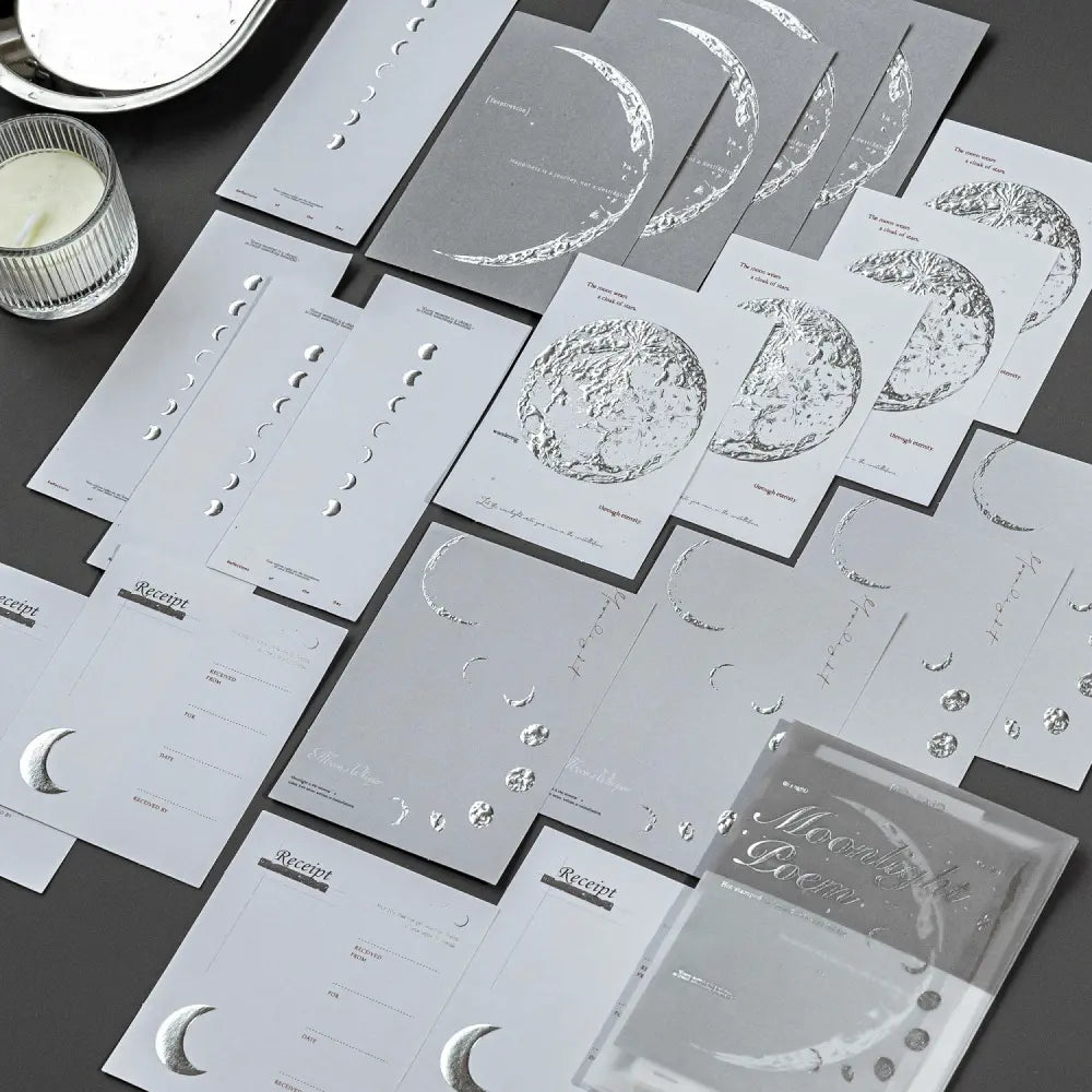 Moonlight Dream memo pad assortment showing six moonlight and botanical paper designs for creative journaling.
