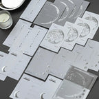 Moonlight Dream memo pad assortment showing six moonlight and botanical paper designs for creative journaling.