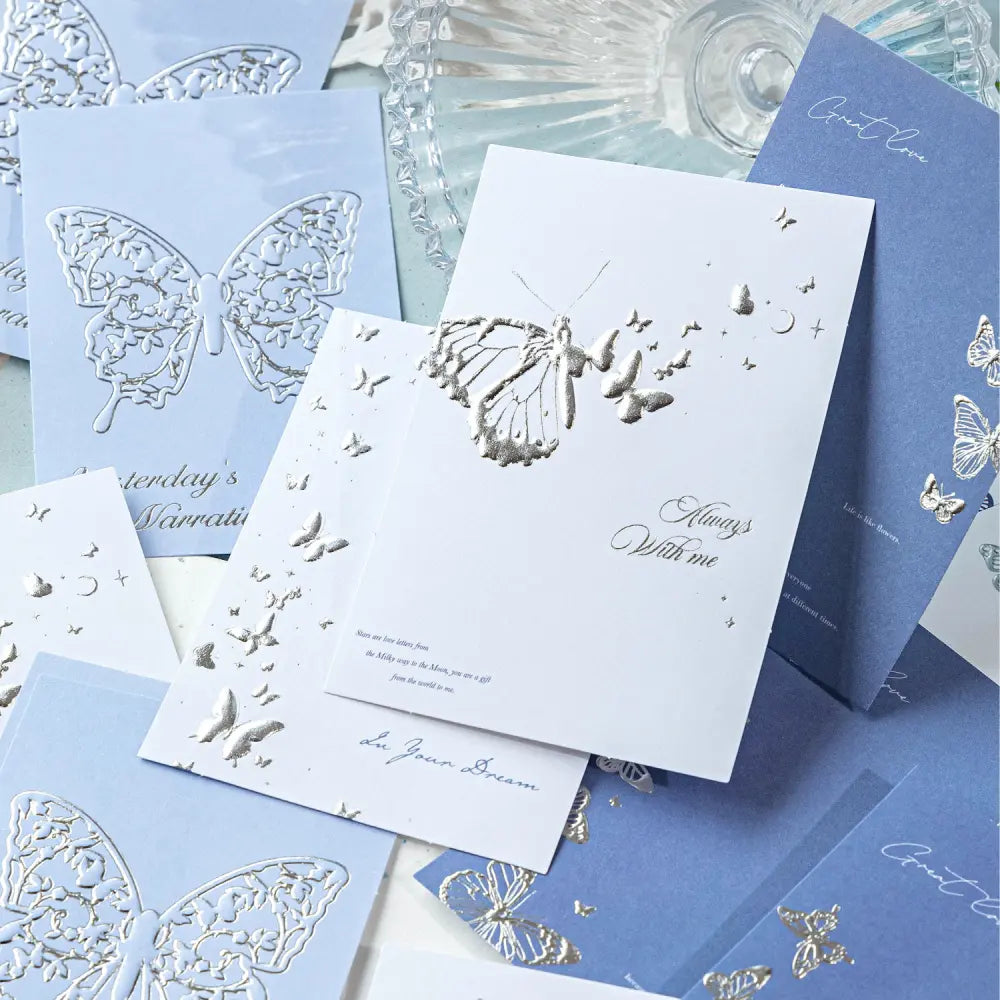 Moonlight Dream memo pad page detail with moon, flower, bird, and butterfly layouts for scrapbook notes.