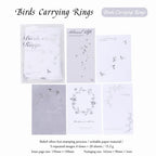 Birds Carrying Rings Moonlight Dream memo pad style with bird and moon artwork for journaling.