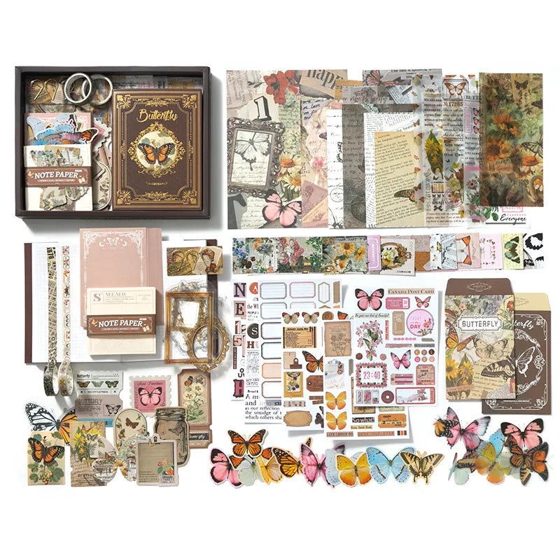 Nature's Whisper Junk Journal Kit flat lay showing the coordinated papers, ephemera, stickers, and craft embellishments included in the set