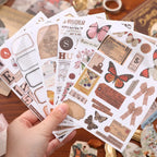 Nature's Whisper Junk Journal Kit gallery image 5 showing earthy botanical papers, stickers, and vintage-style ephemera for junk journaling and collage